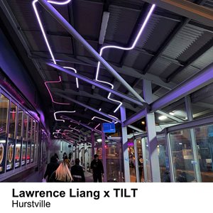 Interwoven purple light installation on celling with people walking beneath it