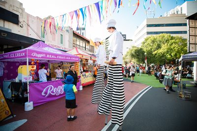 Image of chefs on stilts at In Good Taste festival
