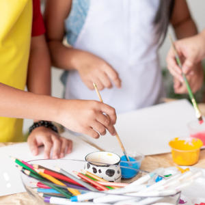 Kids painting with bright colours