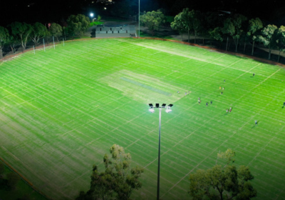 Aerial view of Hurstville Oval at night with lighting turned on