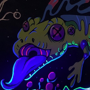 A glow in the dark painting of a green and blue lizard with its tongue out.