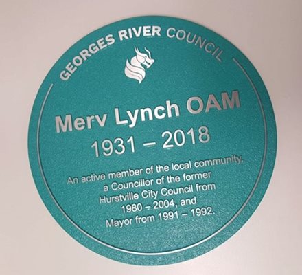 Historical Marker - Merv Lynch OAM 1931-2018. Reads: An active member of the local community, a Councillor of the former Hurstville City Council from 1980-2004, and Mayor from 1991-1992