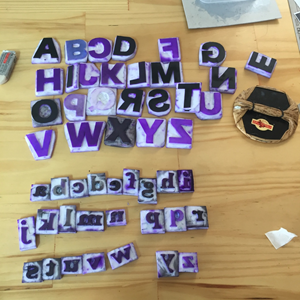 purple upper and lower case letter stamps