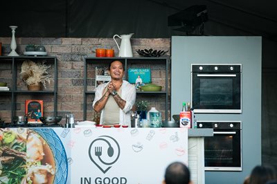 Image of Khanh Ong from MasterChef doing a cooking presentation