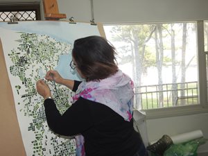 The artist, Susan, working on a mosaic artwork on Carss Park artist studio