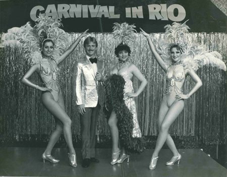 three ladies and a gentleman posing for a Carnival in Rio picture