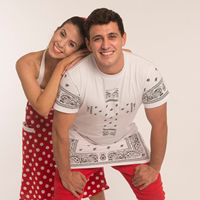 Adrian and Monique from SplashDance, posing for the photo in red and white clothes